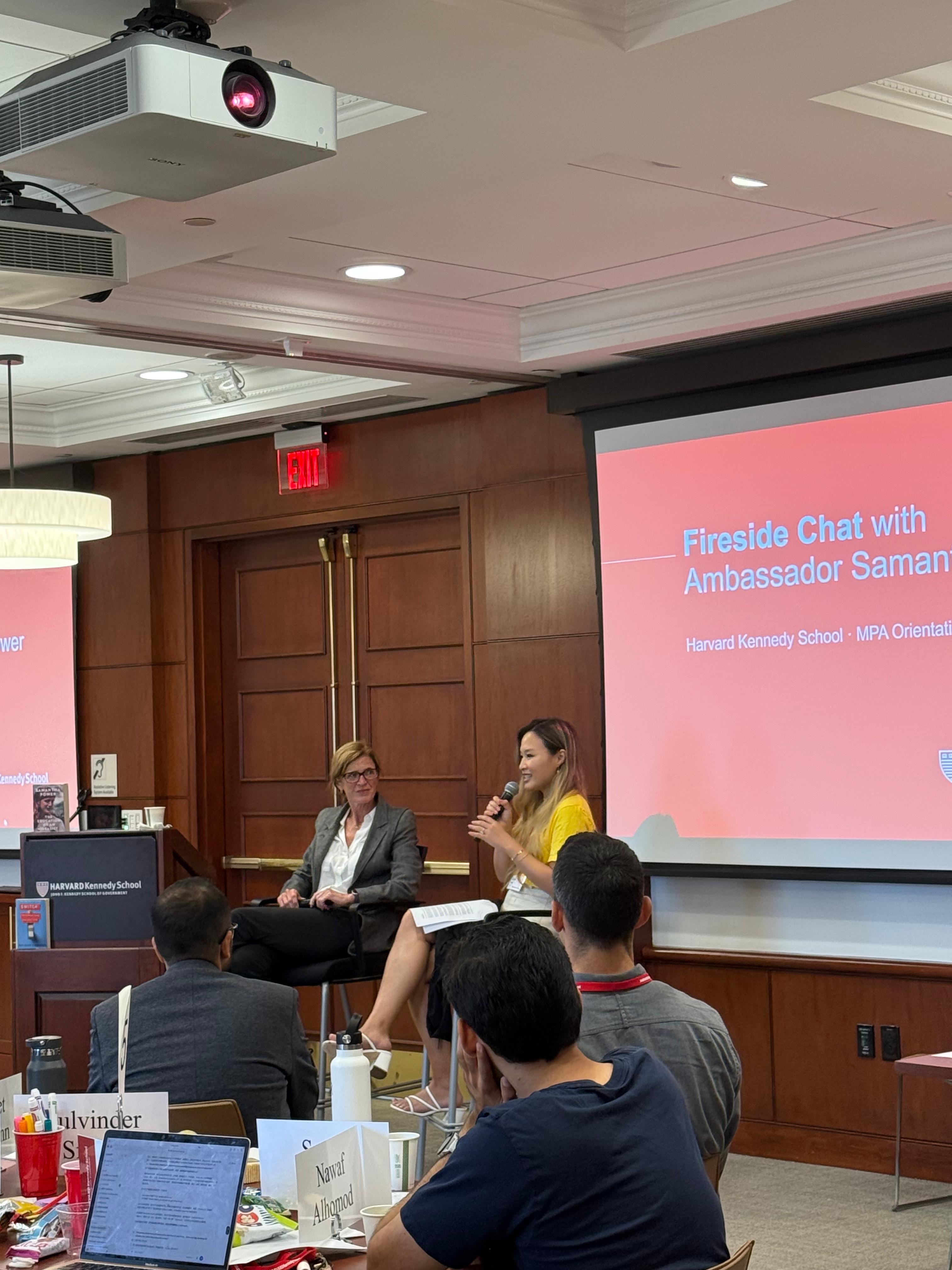 Xinyi hosting the fireside chat with Ambassador Samantha Power on stage